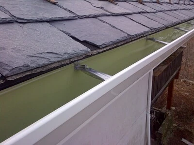 Commercial gutter installation - Need: 800x600px image of commercial building gutter system