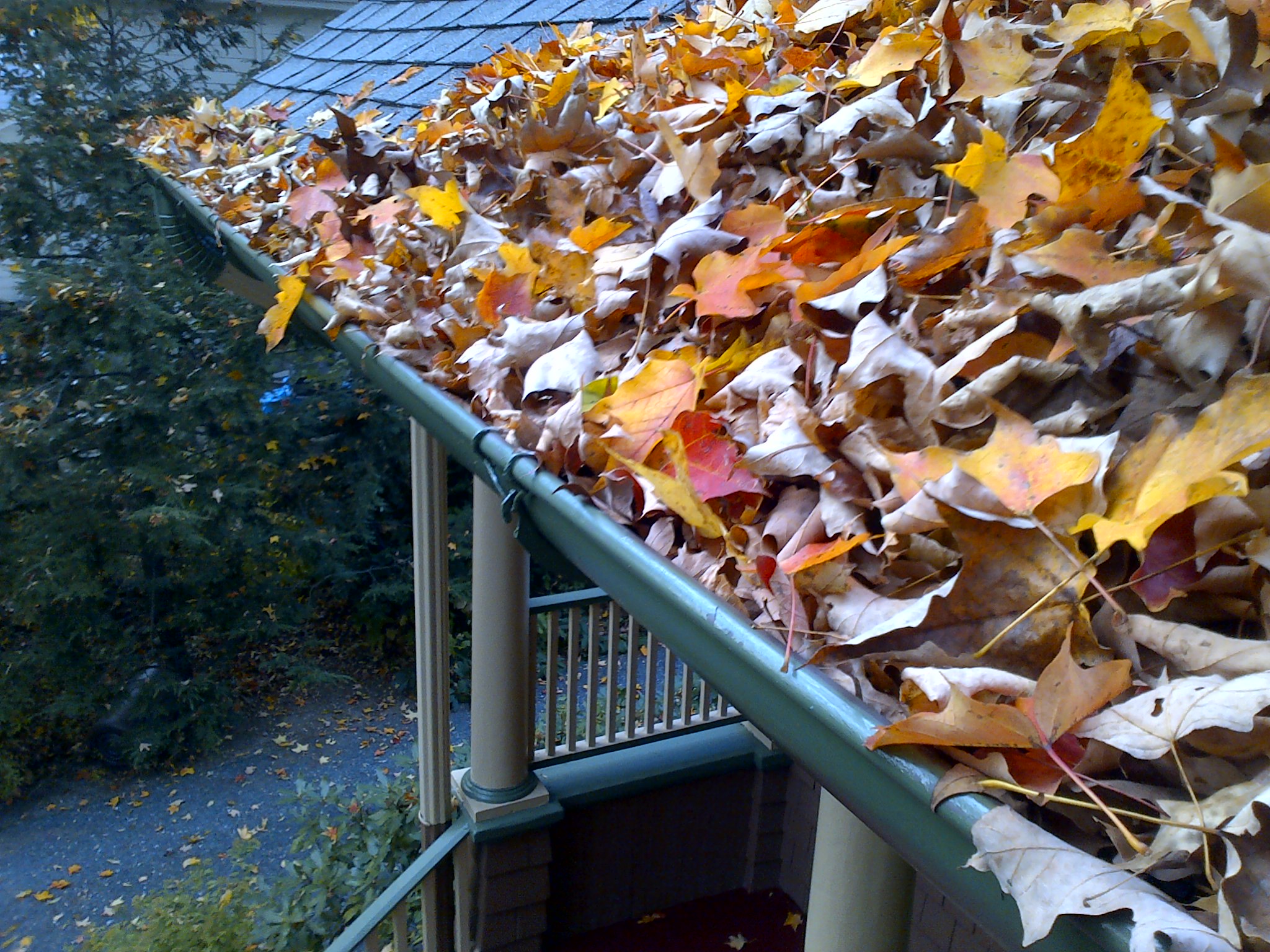Example of damage caused by poor gutter installation - water damage to home exterior showing why quality matters