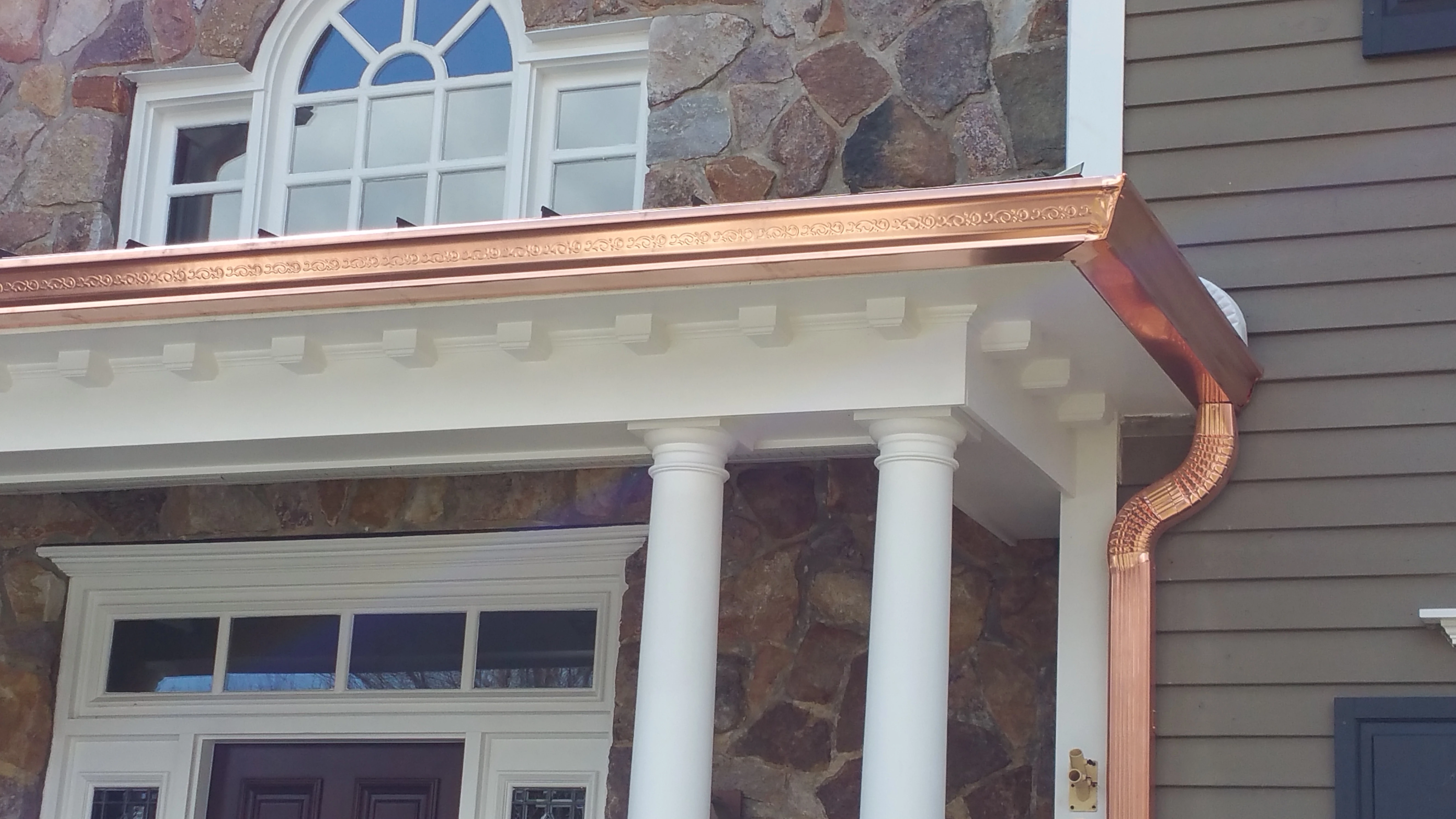 Copper gutter system - Need: 400x300px image of copper gutter installation