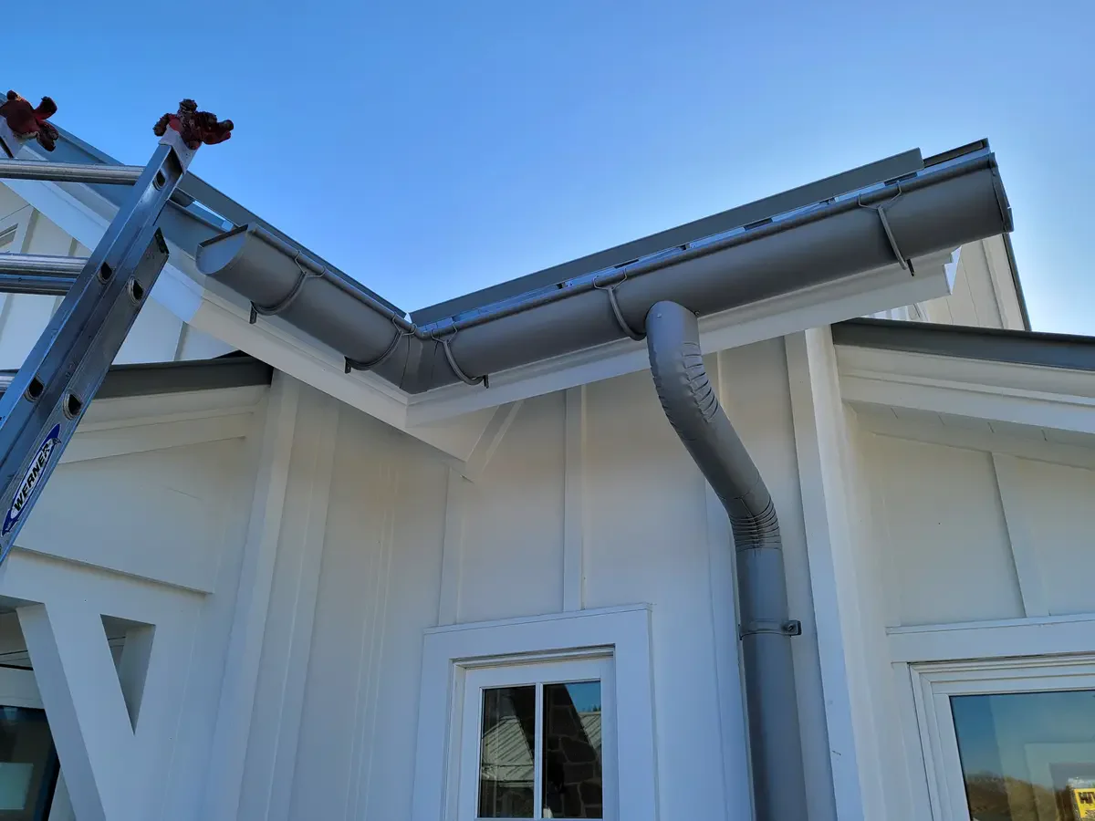 Bronze patina copper gutters - Need: 400x300px image of copper gutters showing early bronze weathering