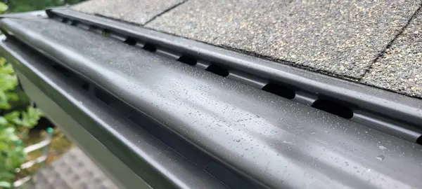 Beautiful home with Guttershell protection - Need: 1920x1080px image of home with clean gutters and Guttershell installed