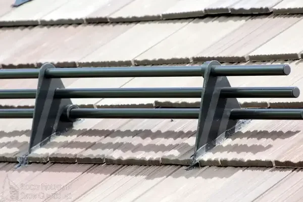 Rail style snow guards - Need: 300x200px image of rail-style snow guard system