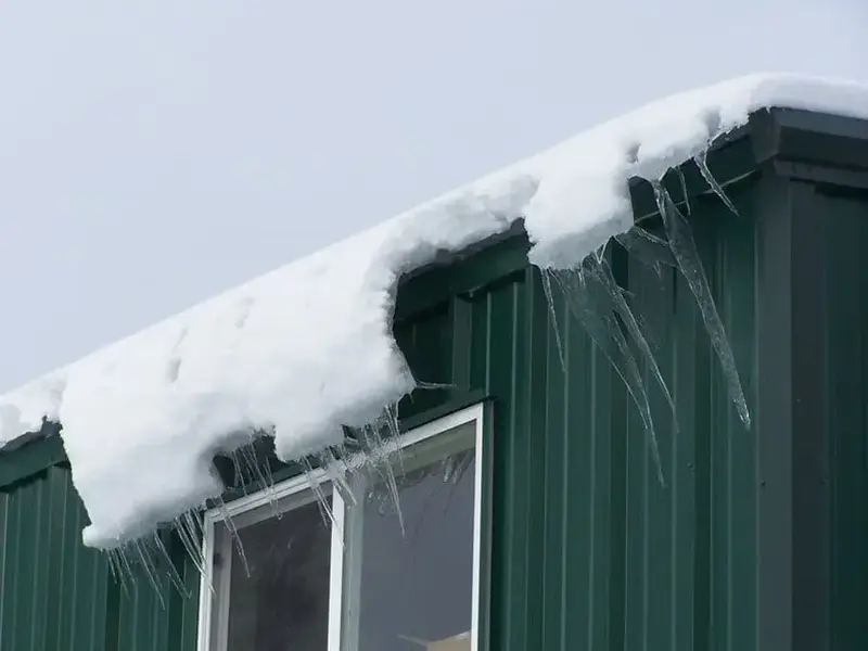 Snow slide damage - Need: 600x400px image showing damage from roof snow slide